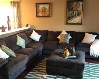 Perfect Condition! Ashley Charcoal Color Sectional with Ottoman!
Only $800! Call Donna at 850-516-2425