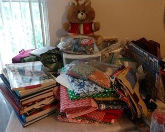 Books on needlepoint & yarn more material cut for quilting