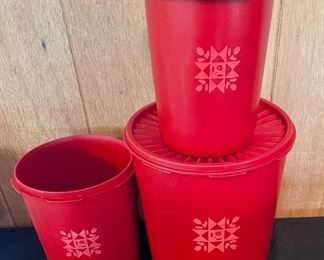 Red Tupperware canisters
