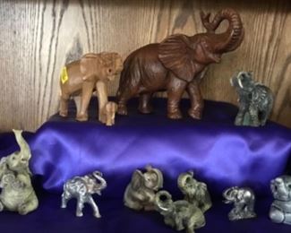 Elephants, many different mediums, glass, volcanic stone, pottery, crystal 