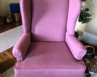 Mauve wing back chair. 