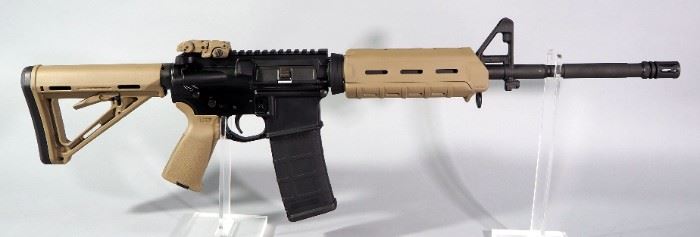 Bushmaster XM15-E2S 5.56 Nato/.223 Cal Rifle SN# L2016705, With Adjustable Stock, Flip Up Rear Sight And Paperwork, In Hard Case
