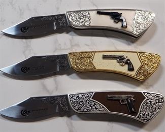 Franklin Mint Collector Knives Featuring Colt Handguns, Includes 1911 Automatic, 1890 Bisley, And 1955 Python, With Display Box And Carry Cases
