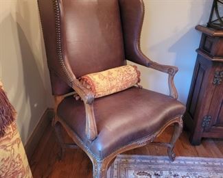 Pair of leather chairs. 45" high x 28' wide x 23" deep.
