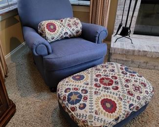 Upholstered chair and Ottoman.
