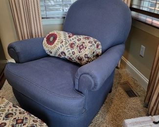Blue upholstered chair. 37" high x 36" wide x 36" deep.