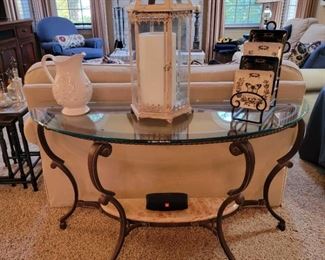 Glass demi-lune accent table. 29" high x 52" wide x 19" deep.