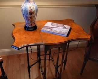 Swing leg table. Measures 30" high x 31" wide x 21" deep as shown. 10" wide when closed.