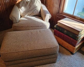 Upholstered chair and ottoman. 27" high x 32" wide x 35" deep. Ottoman measures 16" high x 32" wide x 20" deep.