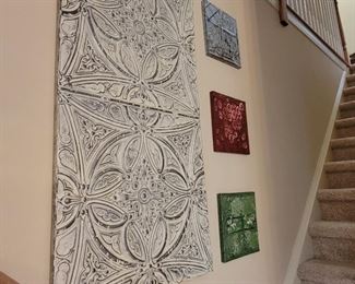 Metal tiles. Large tile is 47" x 23". Smaller tiles are 11" square.