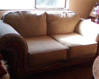 Rolled arm neutral loveseat.  