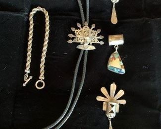 A heavy sterling watch chain, another bolo and more pendants