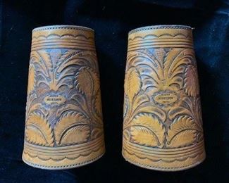 Leather cuff guards by Clint Mortensen