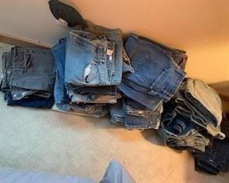 Dozens of vintage denim jeans