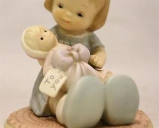 
57 - 1995 Enesco Figurine "Wrapped in Love and Happiness" 4.5" tall