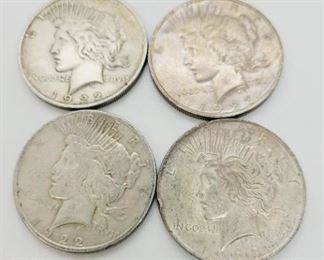 
107c - Lot of 4 Assorted Dates Silver Peace Dollars
