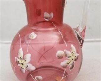 
221x - Enamel Painted Cranberry Art Glass Pitcher 6" tall