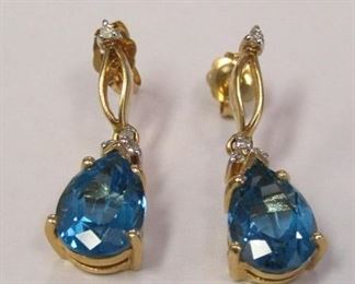 228z - 14k Blue Topaz Earrings .08 Diamond Yellow gold