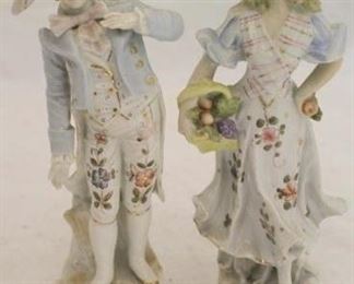 
900 - Pair porcelain man & woman figurines 10" tall