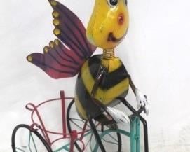 1367 - Metal bee on tricycle planter 35" tall
