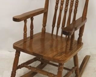 2568 - Child's carved spindle back rocking chair 30 x 13 1/2 x 25

