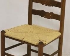 2579 - Bowtie carved ladder back chair 41 1/2 x 17 1/2 x 15
