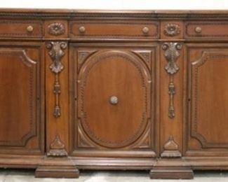 2655 - Heavily carved monumental early sideboard AS IS - back left foot detached, needs to be fixed, door hinges need to be screwed in 43 1/2 x 98 x 21
