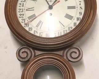 2707 - Howard Miller calendar wall clock 22 1/2" tall
