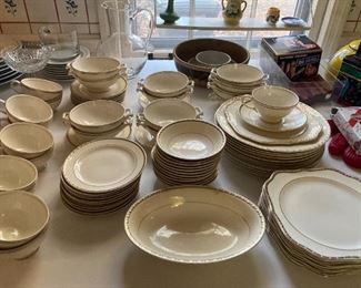 Homer Laughlan  12 dinner plates, 10 salad/dessert plate, 12 soup bowls with saucer, 11 cups and saucers, 12 small bowls, 1 serving bowl 