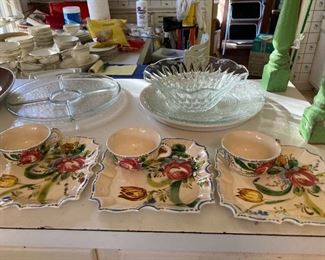 lots of serving dishes and kitchen items