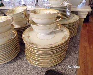 set of Noritake dishes, a large set