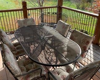 Metal Patio table with 6 chairs & cushions 