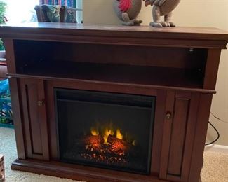 Electric wood fireplace mantel with heater and side storage 