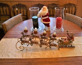 Vintage Santa in Sleigh Candelabra, Santa doll, hurricane lamps and candles 