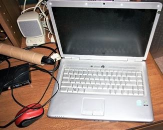 laptop computer, wireless mouse with dongle, PC speakers