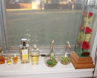 Ladies perfumes, glass terrariums, glass display case 
