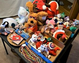 Beanie Baby toys, stuffed animals, play money, stuffed dolls, plastic beads, playing cards, teddy bears, santas