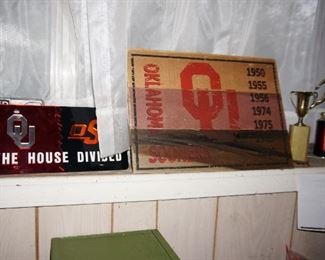OU and OSU signs, vintage trophies