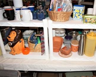 Kitchenware, Lion cookie jar, tea tins, pitchers, Pyrex and glass dishes, thermos, mugs, serving utensils, bowls, cookware, etc.