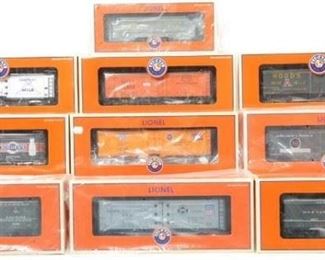 CURRENT OFFER: $290   LOT 9: 10 Lionel milk cars and reefers
Ten cars include 39425 HoodÍs flat with container, 17338 Merchants Dispatch reefer, 17727 Missouri Pacific reefer, 17331 Hoods milk car, 17349 New York Central milk car, 17357 BordenÍs milk car, 17341 DairymenÍs League milk car, 17380 Pacific Fruit Express refrigerator car, 17377 American Railway Express agency, and 17398 Atlantic and Pacific milk car. Cars are C8 to C10.