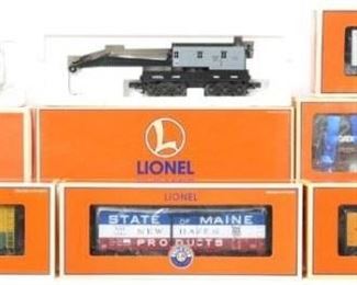 CURRENT OFFER: $220   LOT 15: 7 Lionel freight cars
Description: Includes 19647 GATX Tank Train intermediate car with mildew on box, 58508 Genesee Brewing boxcar,.52500 TCA Santa Fe Grand Canyon reefer, 52566 LOTS New Haven State of Maine boxcar, 52483 Rutland TCA boxcar, 51301 Lackawanna refrigerator factory wrapped, and 19834 Lionel Lines crane car. Items are C7+ to C9+.