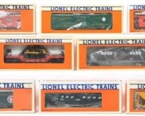 CURRENT OFFER: $185   LOT 1: 10 Lionel freight cars   
Description: Lionel modern O gauge freight cars in original boxes. Ten cars include 17311 Railway Express standard O reefer, 19505 Great Northern reefer, 19710 Frisco extended vision caboose, 19401 Great Northern gondola, 19703 Great Northern extended vision caboose, 5720 Great Northern wood side reefer, 19302 Milwaukee Road hopper, 16390 Flat with tank, 16955x2 AT&SF flat with Dodge Challenger. Cars are C8-9. Boxes have some light wear.