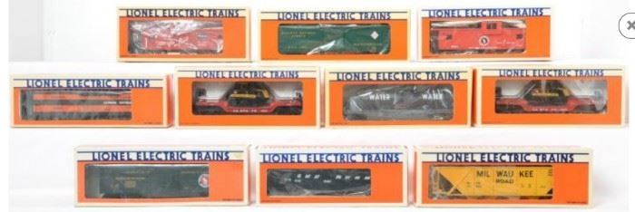 CURRENT OFFER: $185   LOT 1: 10 Lionel freight cars   
Description: Lionel modern O gauge freight cars in original boxes. Ten cars include 17311 Railway Express standard O reefer, 19505 Great Northern reefer, 19710 Frisco extended vision caboose, 19401 Great Northern gondola, 19703 Great Northern extended vision caboose, 5720 Great Northern wood side reefer, 19302 Milwaukee Road hopper, 16390 Flat with tank, 16955x2 AT&SF flat with Dodge Challenger. Cars are C8-9. Boxes have some light wear.