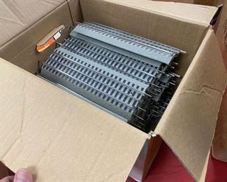 CURRENT OFFER: $300   LOT 23: CURRENT BID IS $300
10” Straight Fas Track straight
(36 Pieces)
FasTrack O36 45 Degree Track
(4 Pieces)
Box of FasTrack Specialty Tracks
(10 Pieces as pictured)