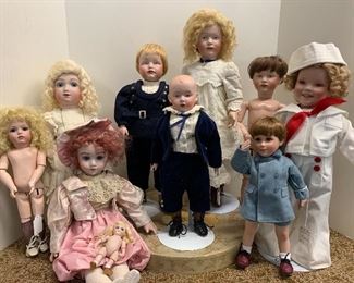 Finely painted reproduction dolls