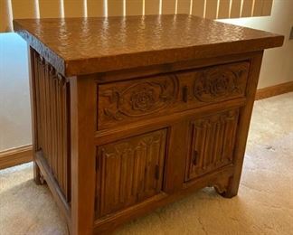 Vintage hand-made end table, heavily carved.