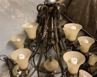 Pair of wrought iron chandeliers