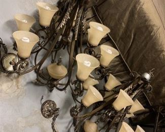 Pair of wrought iron chandeliers