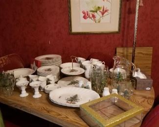 Vintage dining table & chairs full of Christmas dishes... 
Marilyn Chandler watercolor on wall