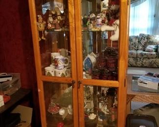 Curio cabinet full of Christmas